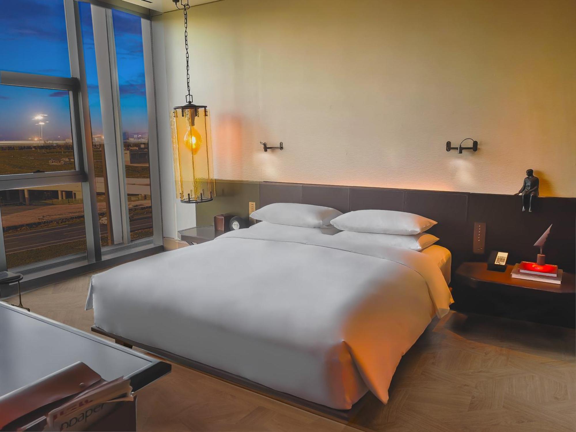 Mumian Beijing Daxing International Airport, Part Of Hyatt Hotel Bagian luar foto A bedroom at the hotel